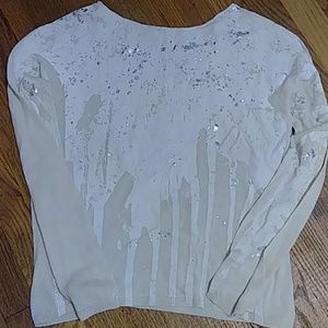 Unique style. Lightweight long sleeve top.